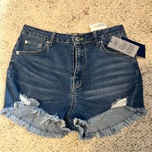High wasted stretchy shorts, size large, longer in back than front